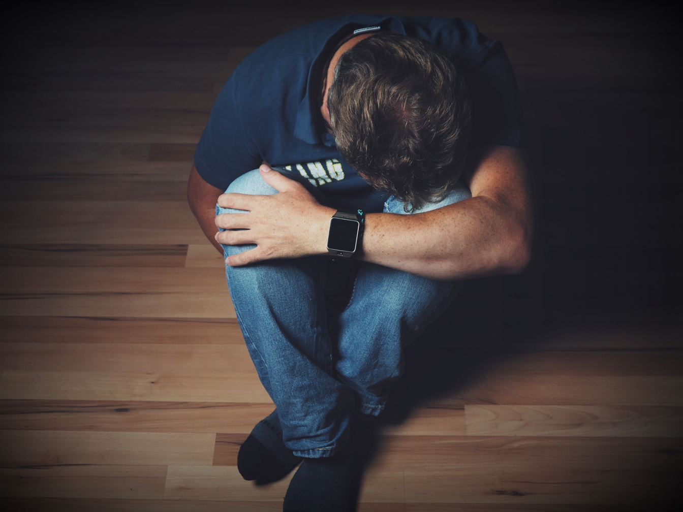 Man Crying on the Ground